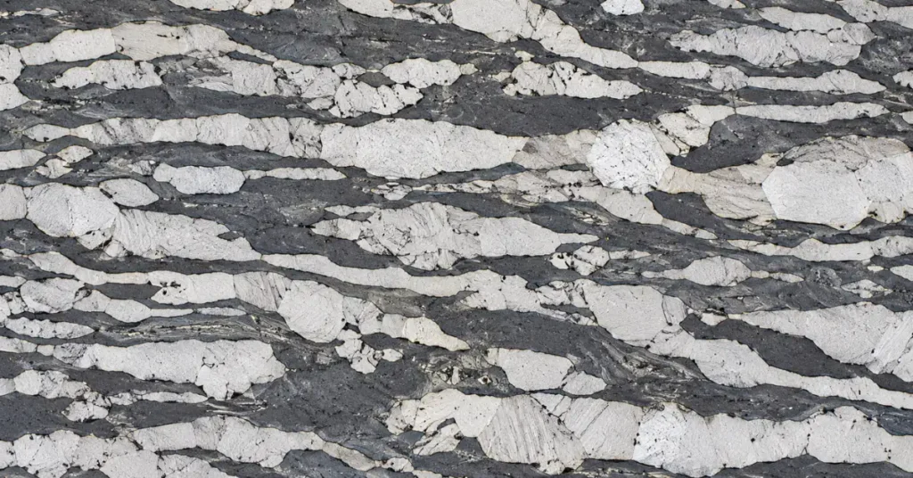 Microscopic view of duplex stainless steel etched grain structure showing 50-50 austenite and ferrite balance.